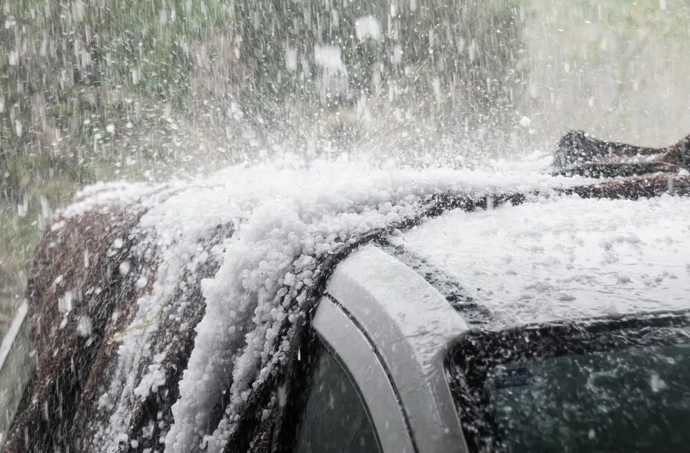 hailstorm pounding top of car