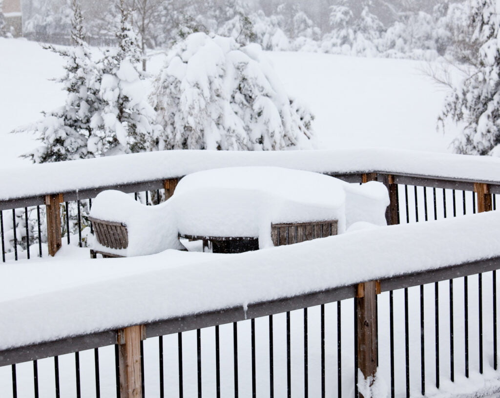 Deep snow on deck with table